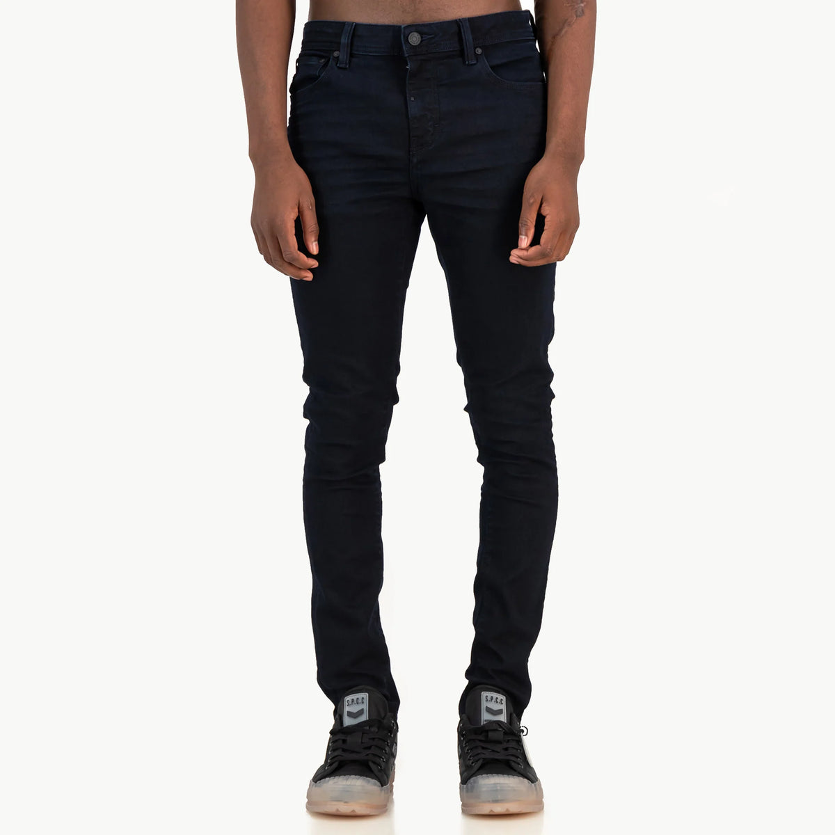 SPCC Monarch Jeans in indigo for men, showcasing classic denim style with a relaxed fit and detailed stitching.