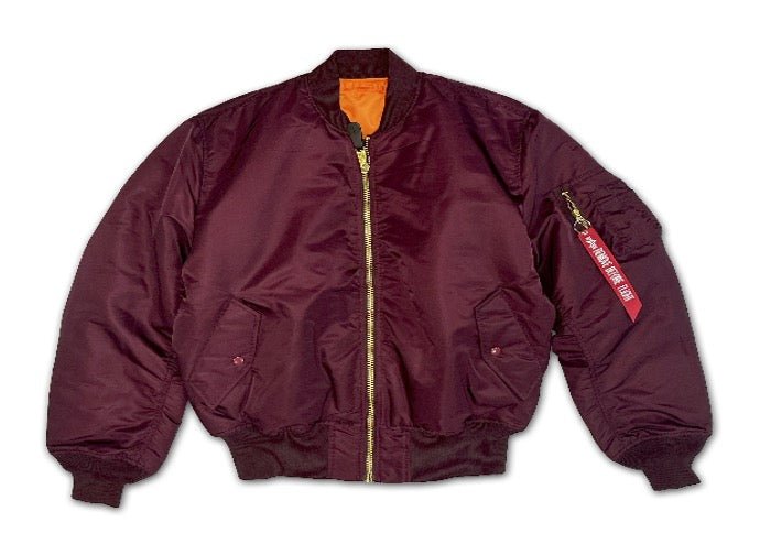 Unisex Alpha MA-1 Classic Jacket in dark cherry color, with ribbed collar and cuffs, displayed on a hanger.