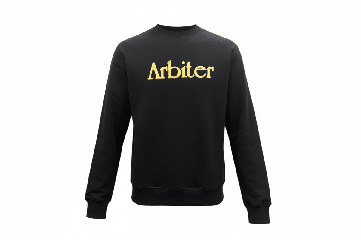 Black Arbiter Fabio men's sweater displayed on a mannequin, featuring a classic knit design and ribbed cuffs.
