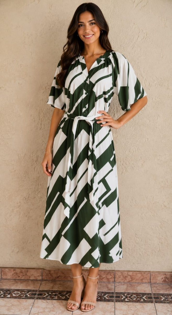 Green Bouchara AS5 women's dress made of rayon and nylon, displayed on a hanger showing its elegant design and fabric texture.