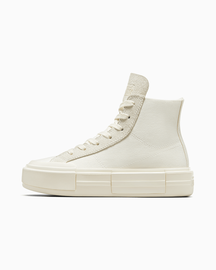 Unisex Converse Hi Chuck Taylor Cruise Egret sneakers with white rubber soles and canvas uppers, casual high-top sneaker style.