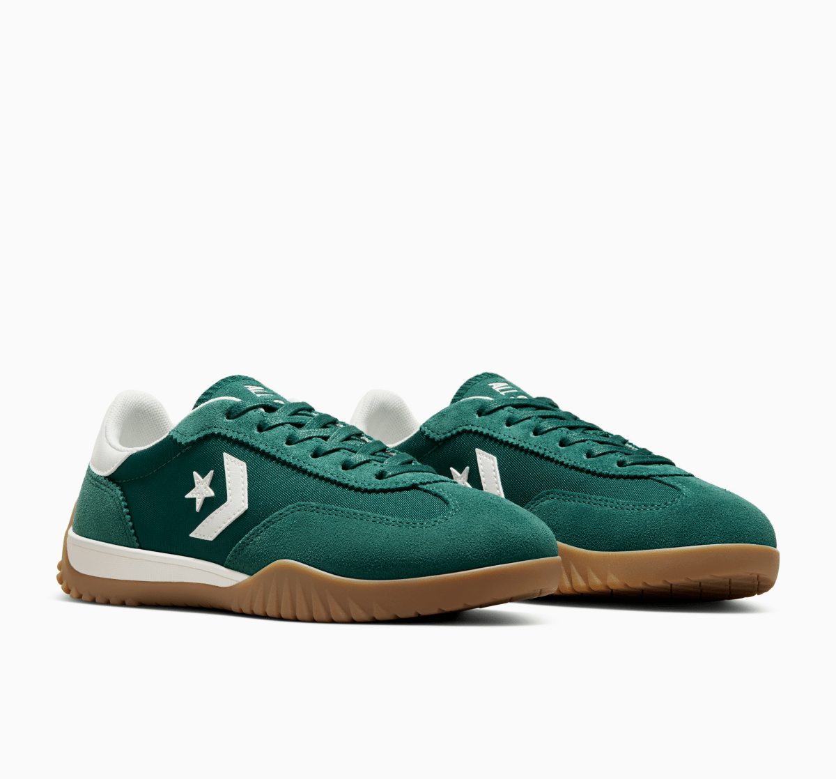 Green Converse Run Star Ox unisex sneakers with chunky white sole and classic branding, side view showing laces and design details.