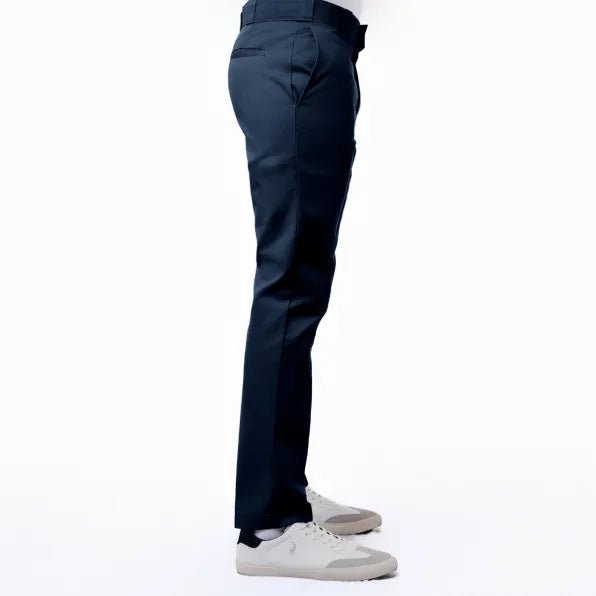 Men's navy Dickies 847 work trousers shown in a close-up image of the durable fabric and classic fit.