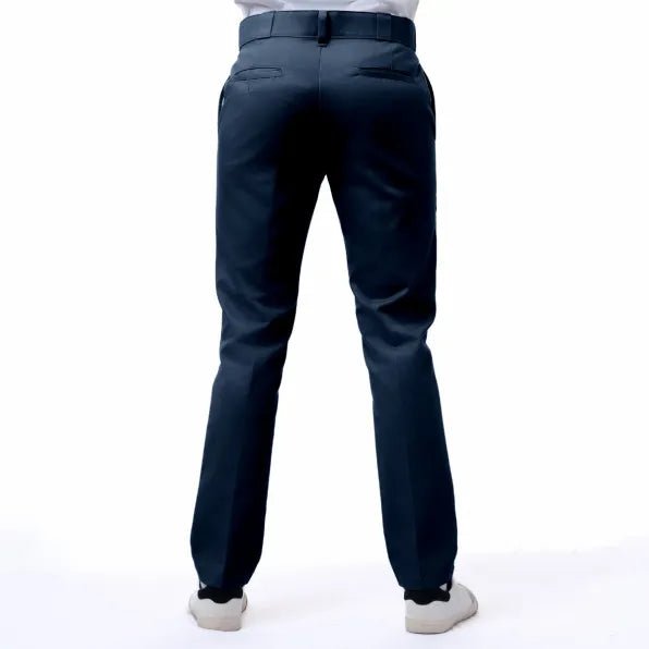 Navy Dickies 847 men's work trousers with a relaxed fit and durable fabric, shown on a hanger.