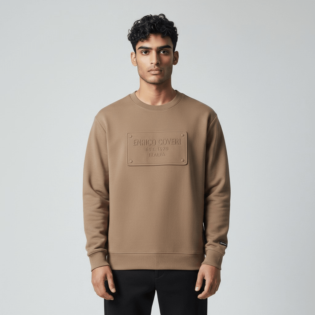 Enrico Coveri men's camel sweater featuring a classic knit design and crew neckline, made from soft, comfortable fabric.