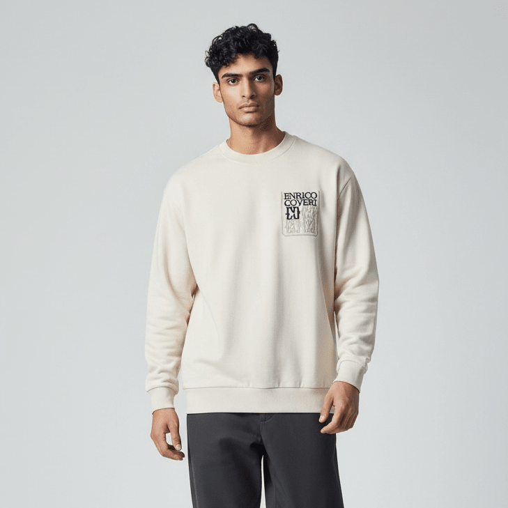 Cream men's sweater by Enrico Coveri, size 46, with a soft knit texture and classic fit, displayed on a neutral background.