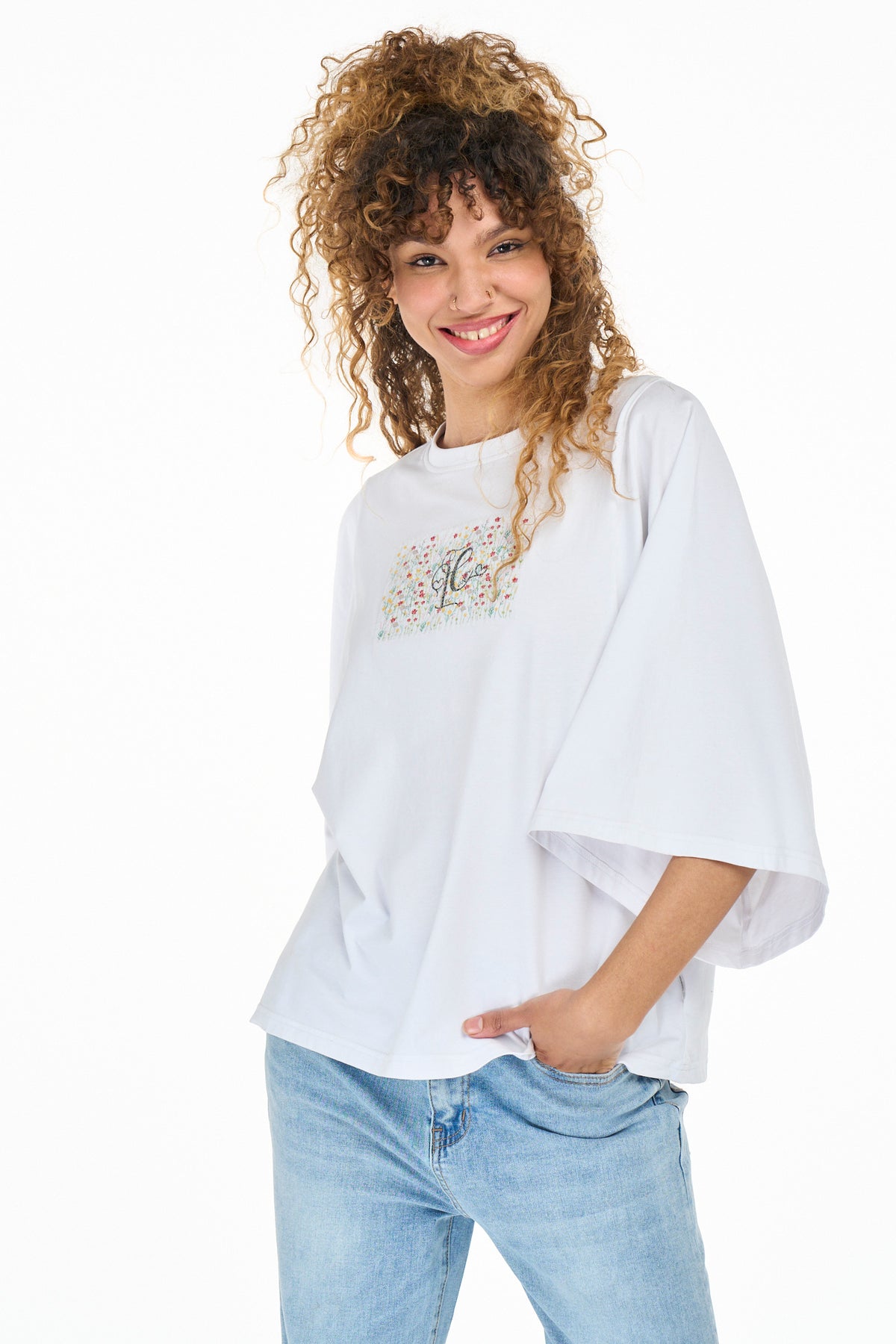 White Lee Cooper Blythe women's T-shirt with a classic fit and short sleeves, displayed on a neutral background.