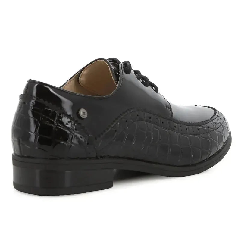 Black patent women's casual footwear by Pierre Cardin featuring a sleek, stylish design with a comfortable fit.