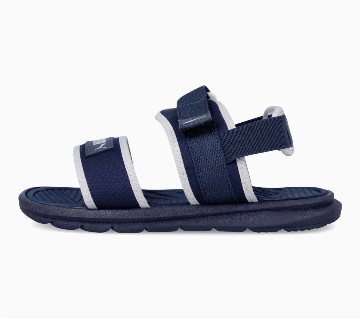 Puma infants Crony Soft 2.0 kids sandals in navy with white accents, soft straps, and cushioned soles for comfortable wear.