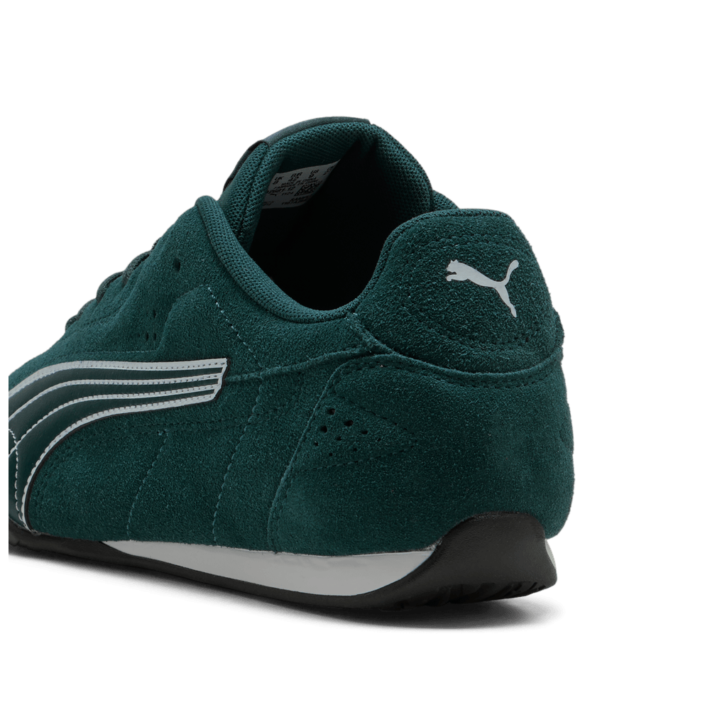 Puma men's Catch Suede sneakers in green, white, and black with suede uppers and sporty design.