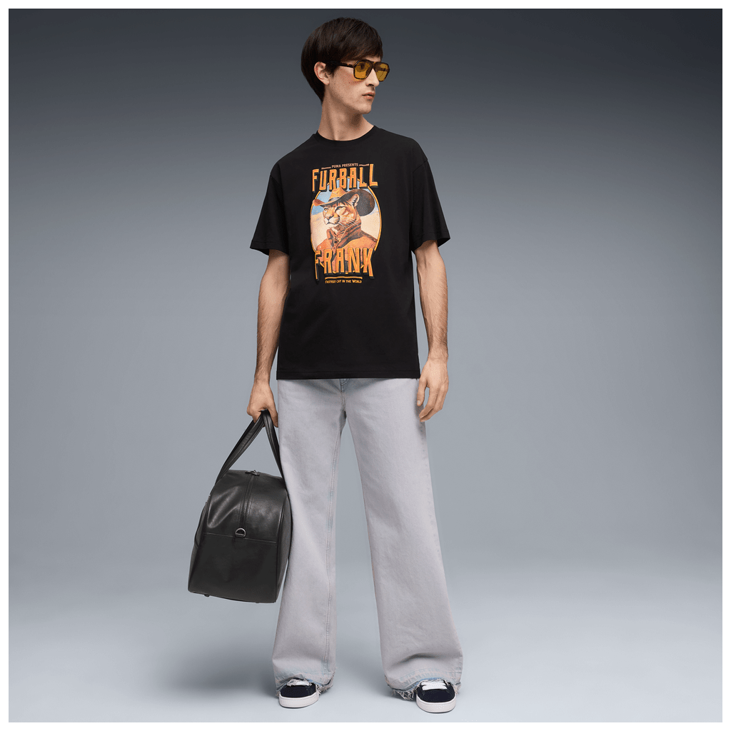 Puma men's graphic cowboy T-shirt in black with Western-inspired design and Puma logo for casual wear.