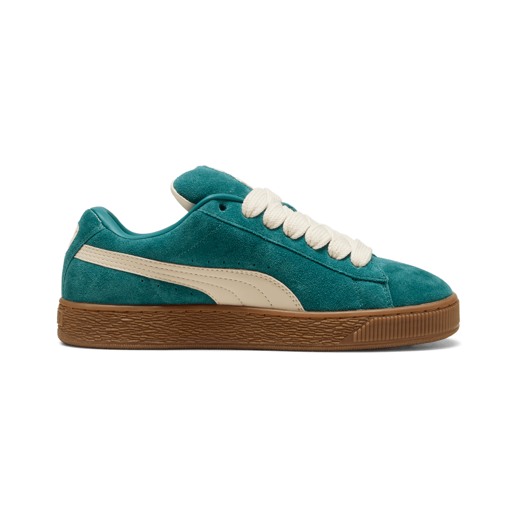 PUMA men's Suede XL sneakers in black with white rubber soles, featuring classic suede texture and sporty design.