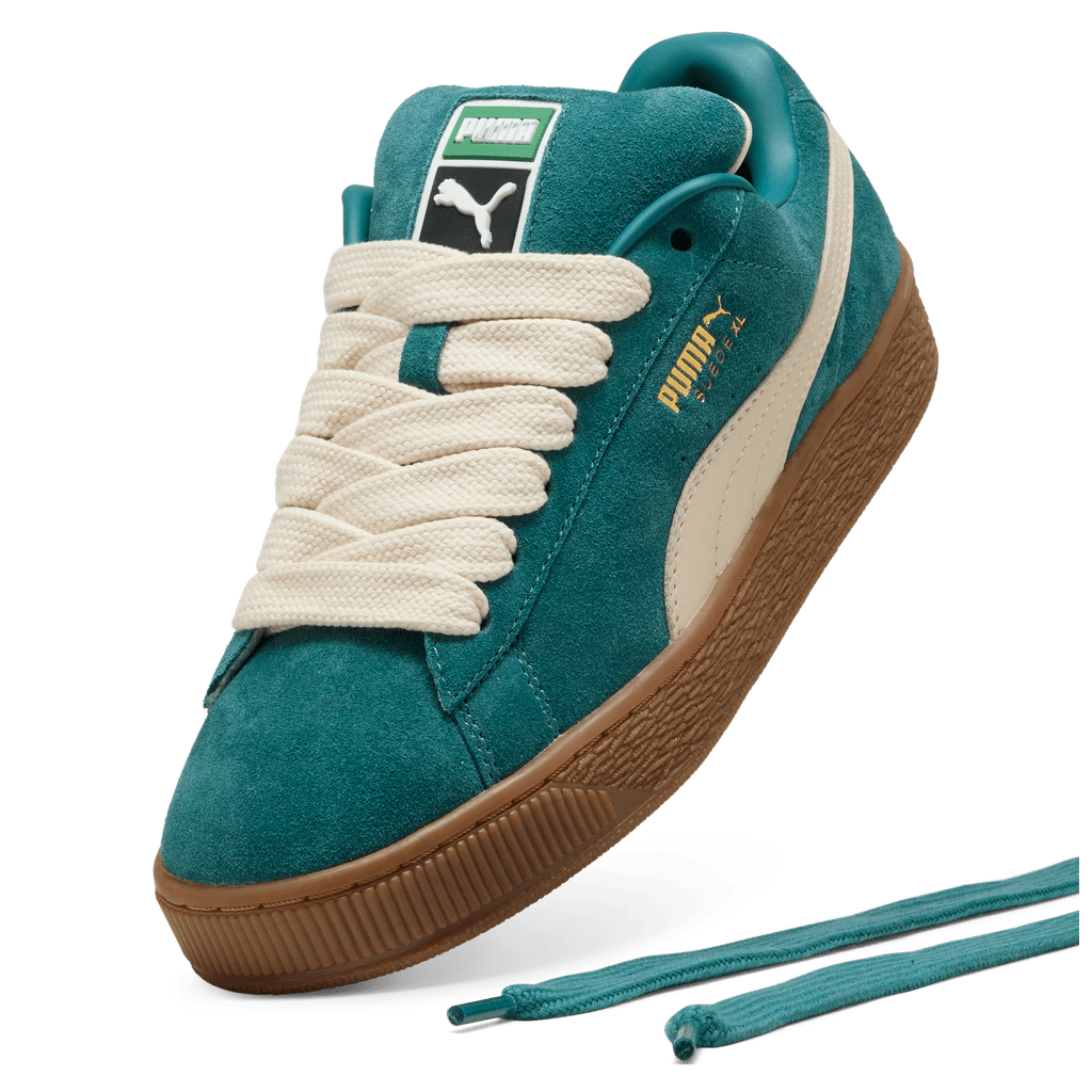 Puma men's Suede XL sneakers in black with white accents, featuring classic suede material and sporty design.