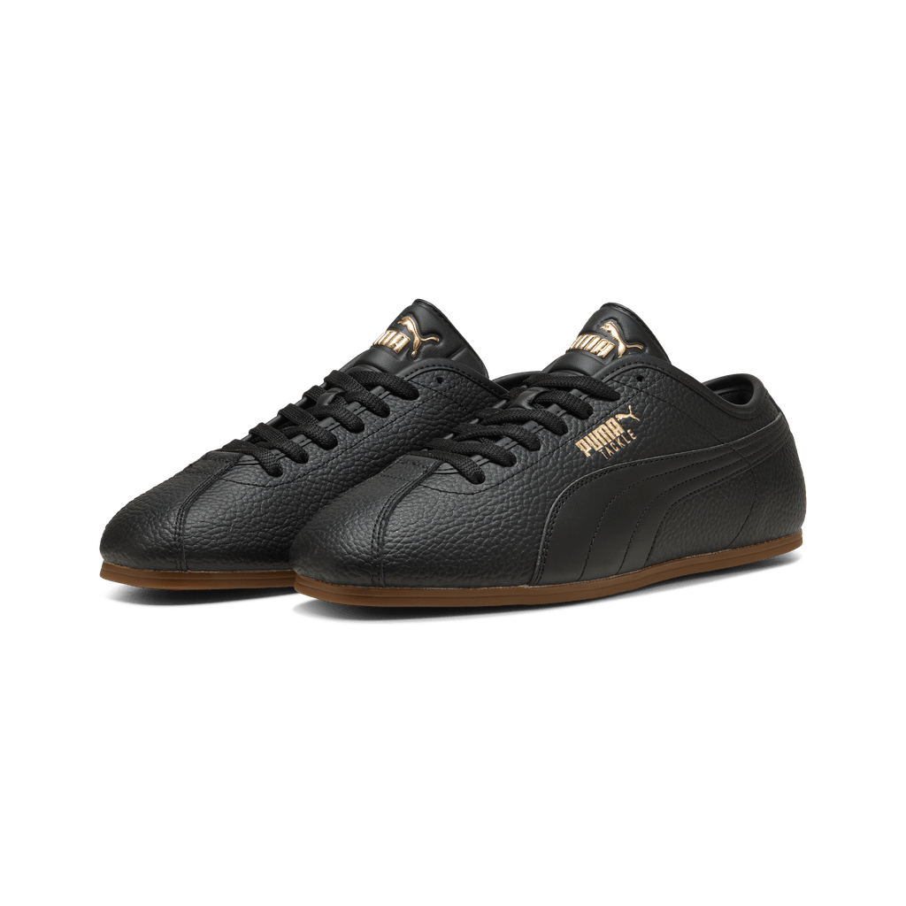 Puma men's Tackle L sneakers in black, gold, and gum with sleek design and athletic style.