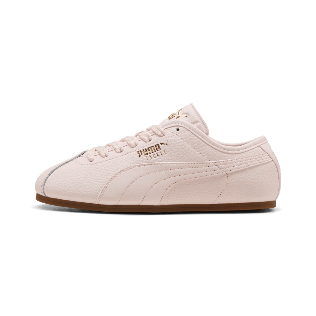 Puma Women's Tackle L sneakers in black with white accents, featuring sporty design and comfortable lacing.