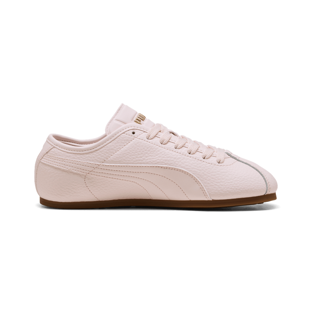 Puma women's Tackle L sneakers in black with white accents, featuring a sleek athletic design and comfortable fit.