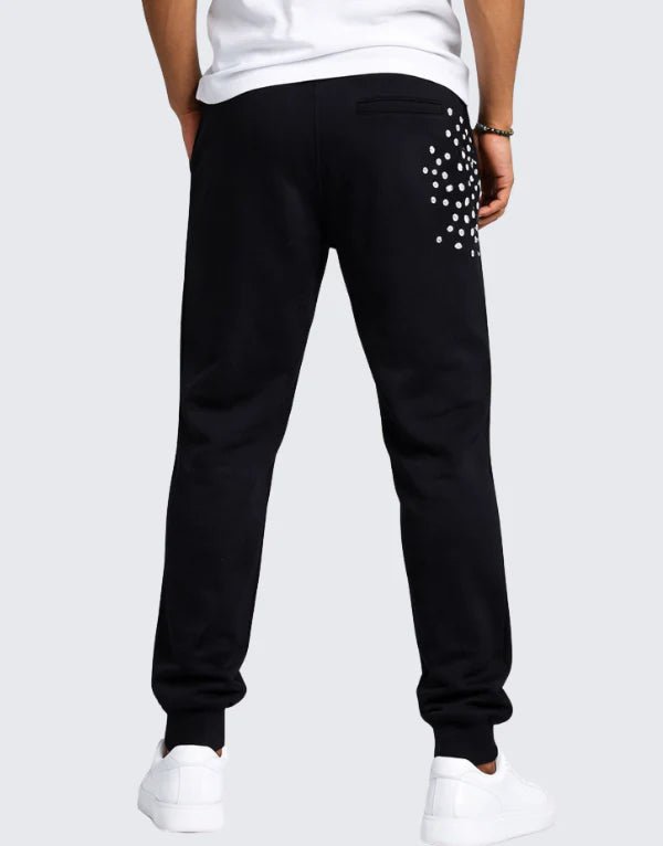 Pure Premium Brava men's track pants in black, featuring a comfortable fit and athletic design for casual wear.