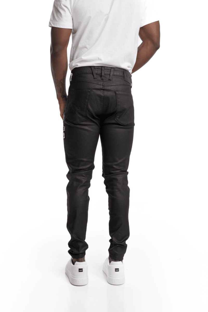 Replay Bronny Wax Denim jeans for men in black with badge details, featuring a stylish waxed denim finish.