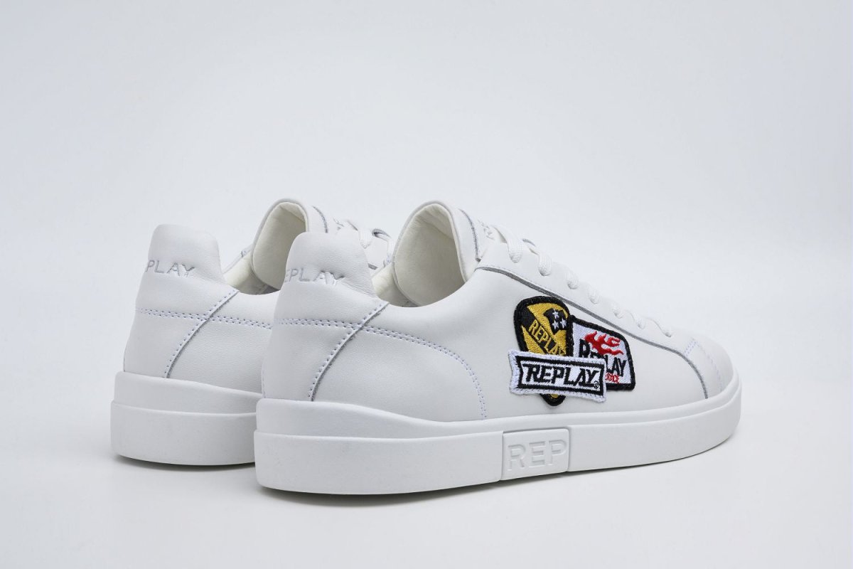 Replay Polys M Combo White men's sneakers with white and black design, featuring sleek athletic style and comfortable fit.