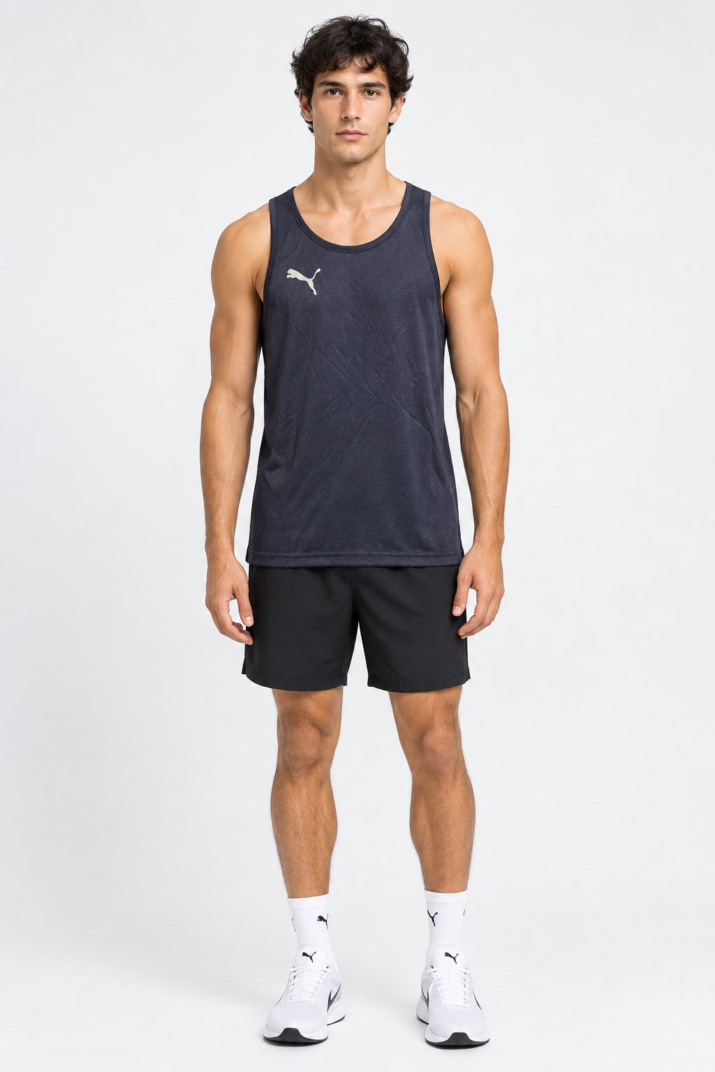 Men's Puma Forever Faster navy vest, athletic sleeveless singlet with Puma logo, lightweight and designed for active wear.