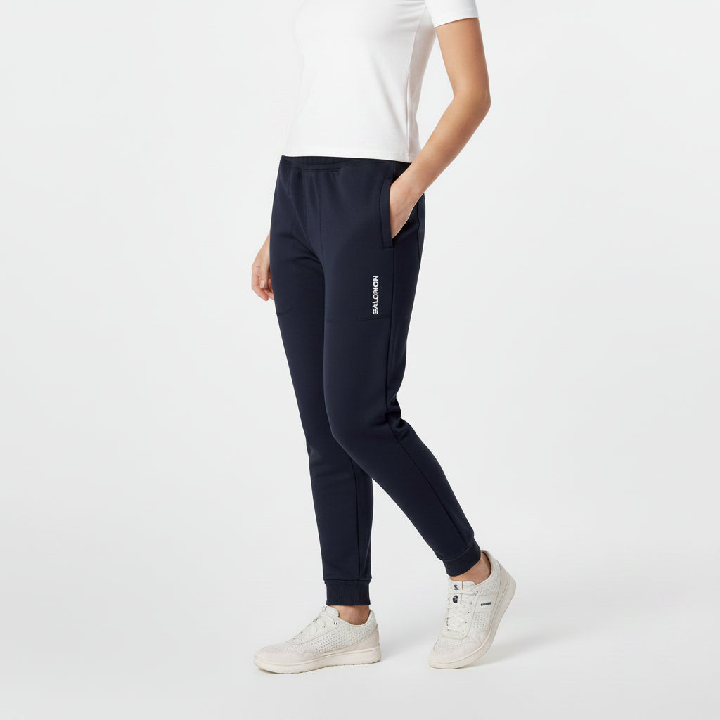 Black Salomon Racer Fleece Pant for women, featuring a comfortable fleece material and athletic fit.