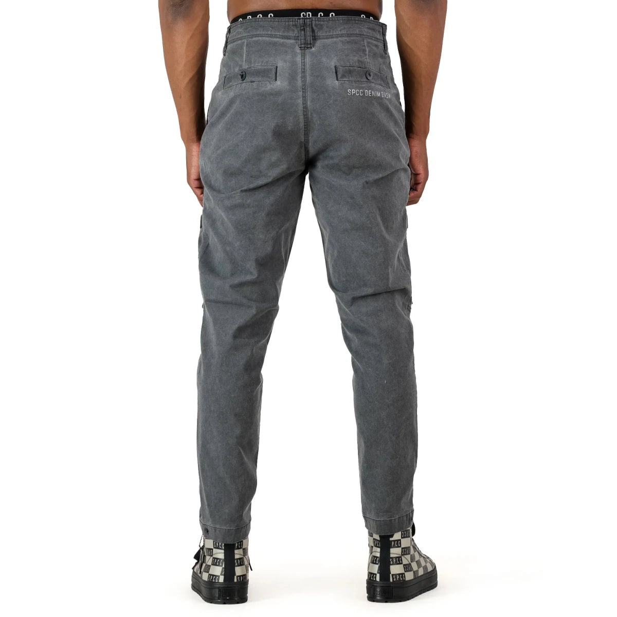 Mens SPCC Alden Cargo Black jeans with multiple pockets and a slim fit, showcasing durable denim fabric and modern style.