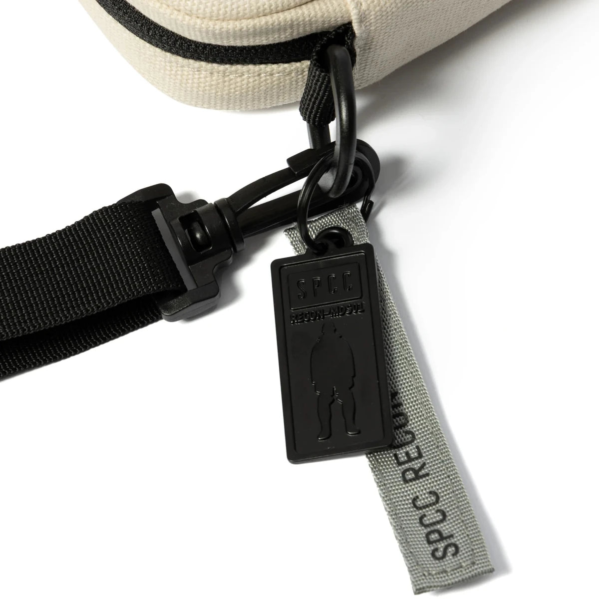 SPCC Dune Force hip bag in off-white, men's luggage style with adjustable strap and sleek design.