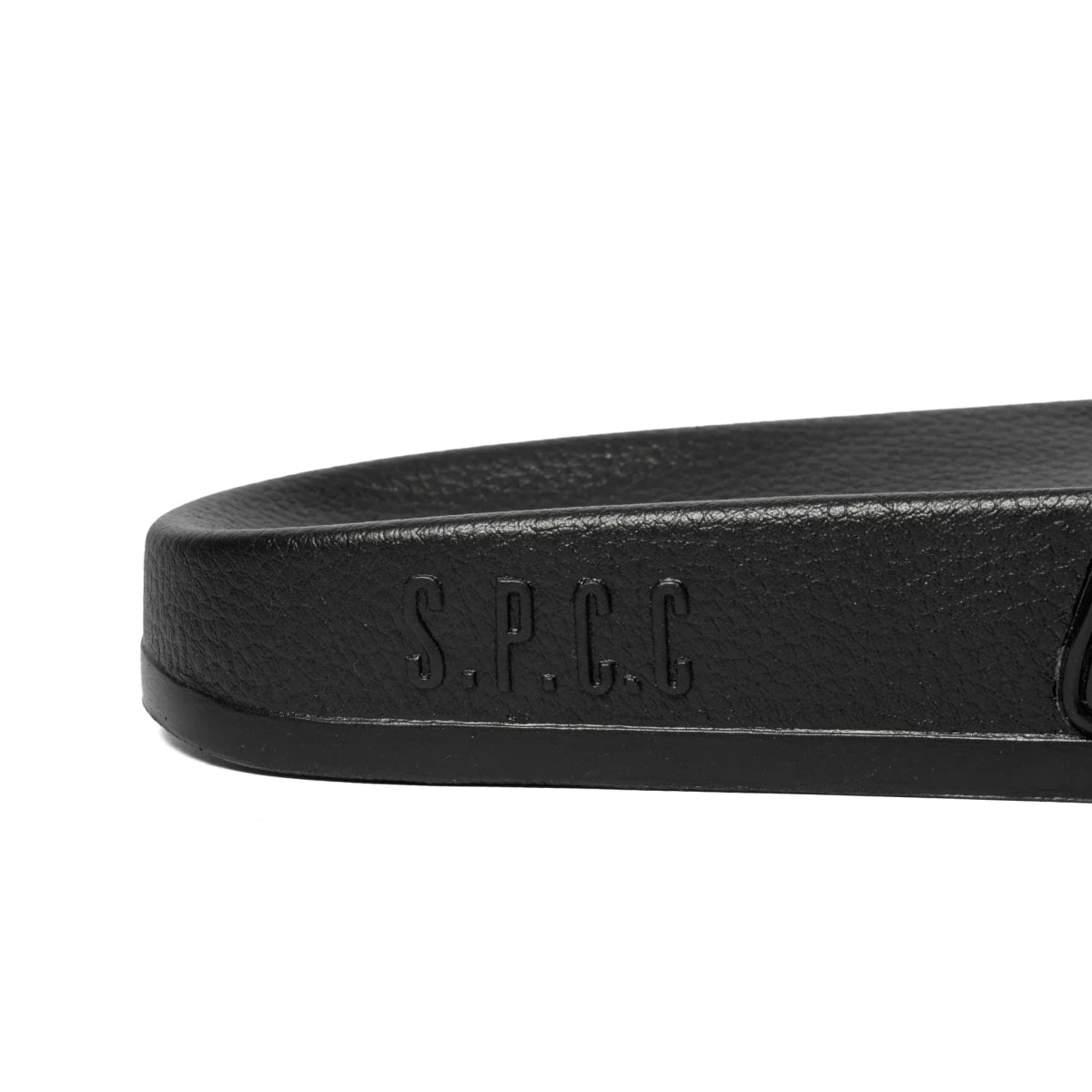 Black SPCC Maxim Slider men's sandals with wide straps and cushioned footbed, shown on a neutral background.