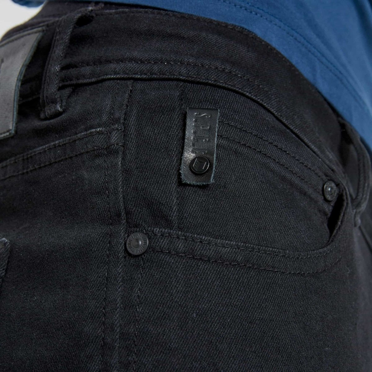 Black SPCC Onyx men's jeans showing a slim fit design with classic five-pocket styling and a dark denim finish.