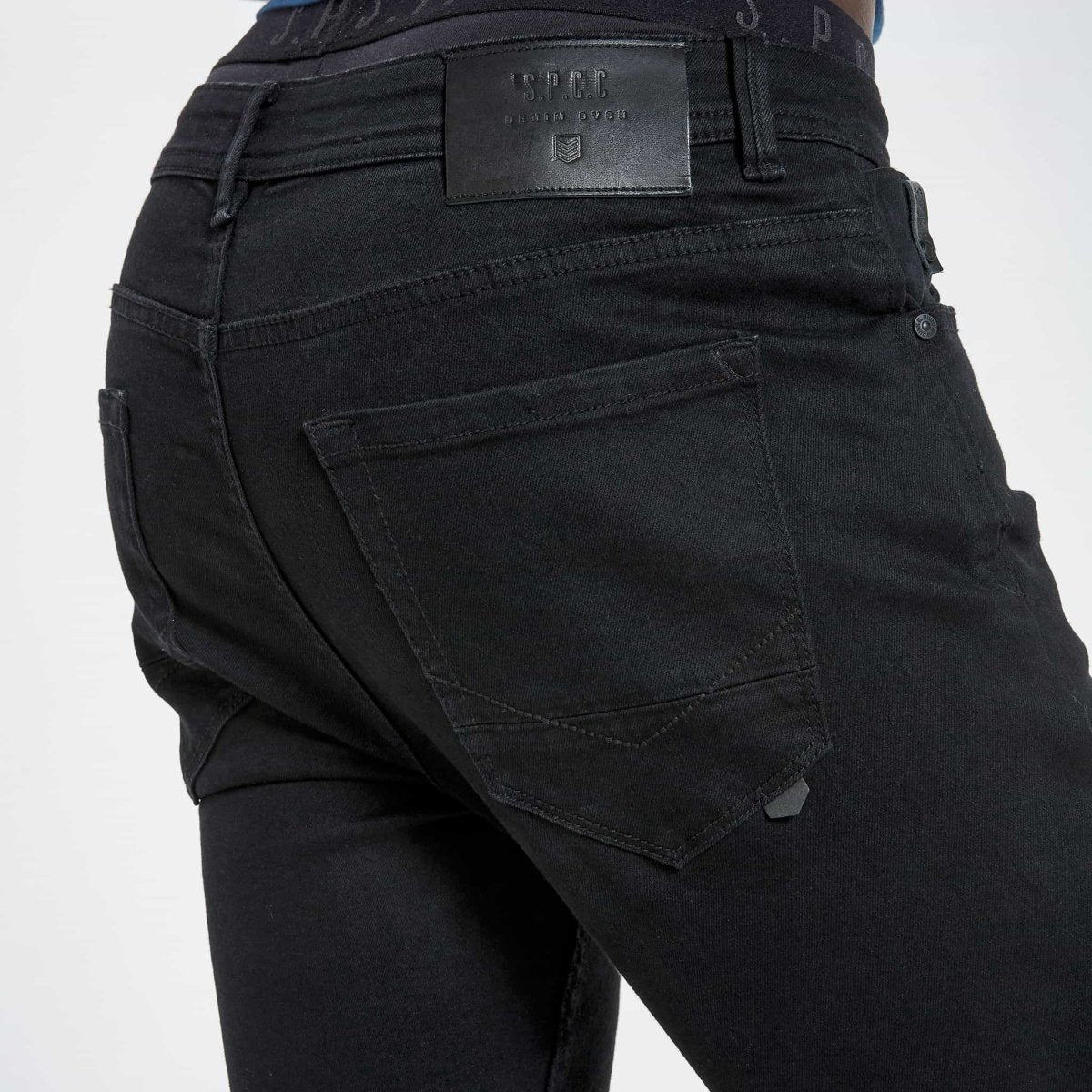 Black SPCC Onyx men's jeans shown with a slim fit design and classic five-pocket style.