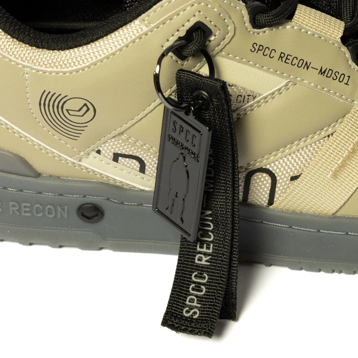 Men's SPCC Recon Dune Force Lo Sneaker in off-white with stylish design and laces, casual athletic footwear for everyday wear.