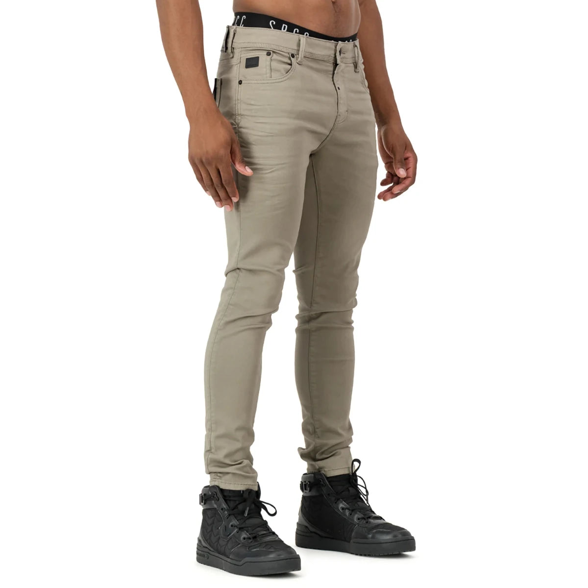 Dark stone wash SPCC Rodan men's jeans with classic fit and five-pocket design, shown hanging on a wooden background.