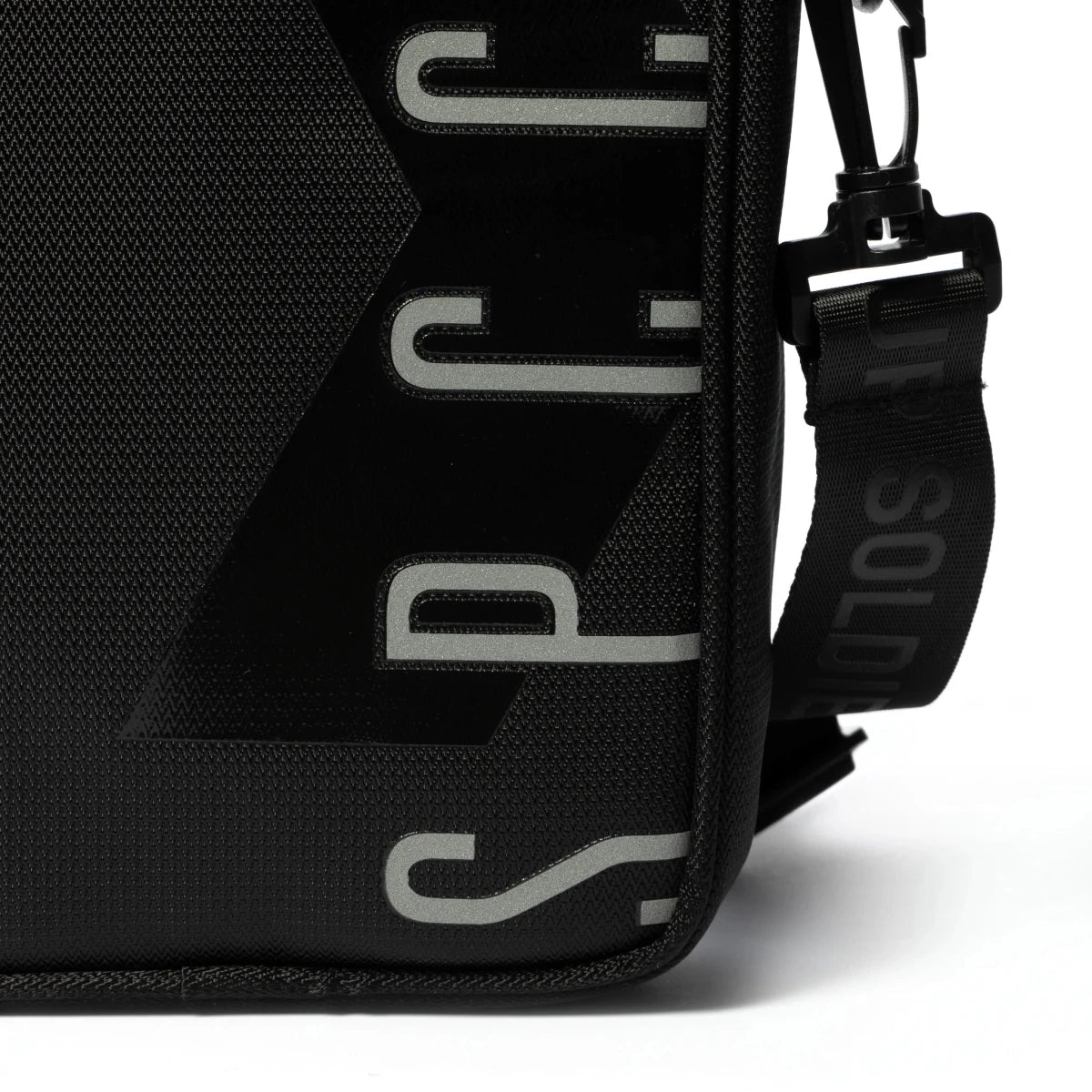 Black SPCC Surge Dust hip bag for men, stylish luggage with multiple compartments and adjustable strap, perfect for everyday use.