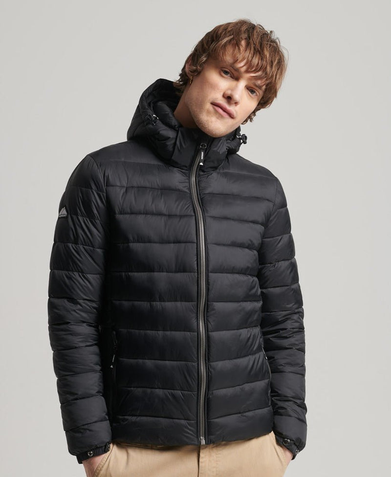 Black Superdry Classic Fuji Puffer Jacket for men, insulated winter jacket with a quilted design and hood.