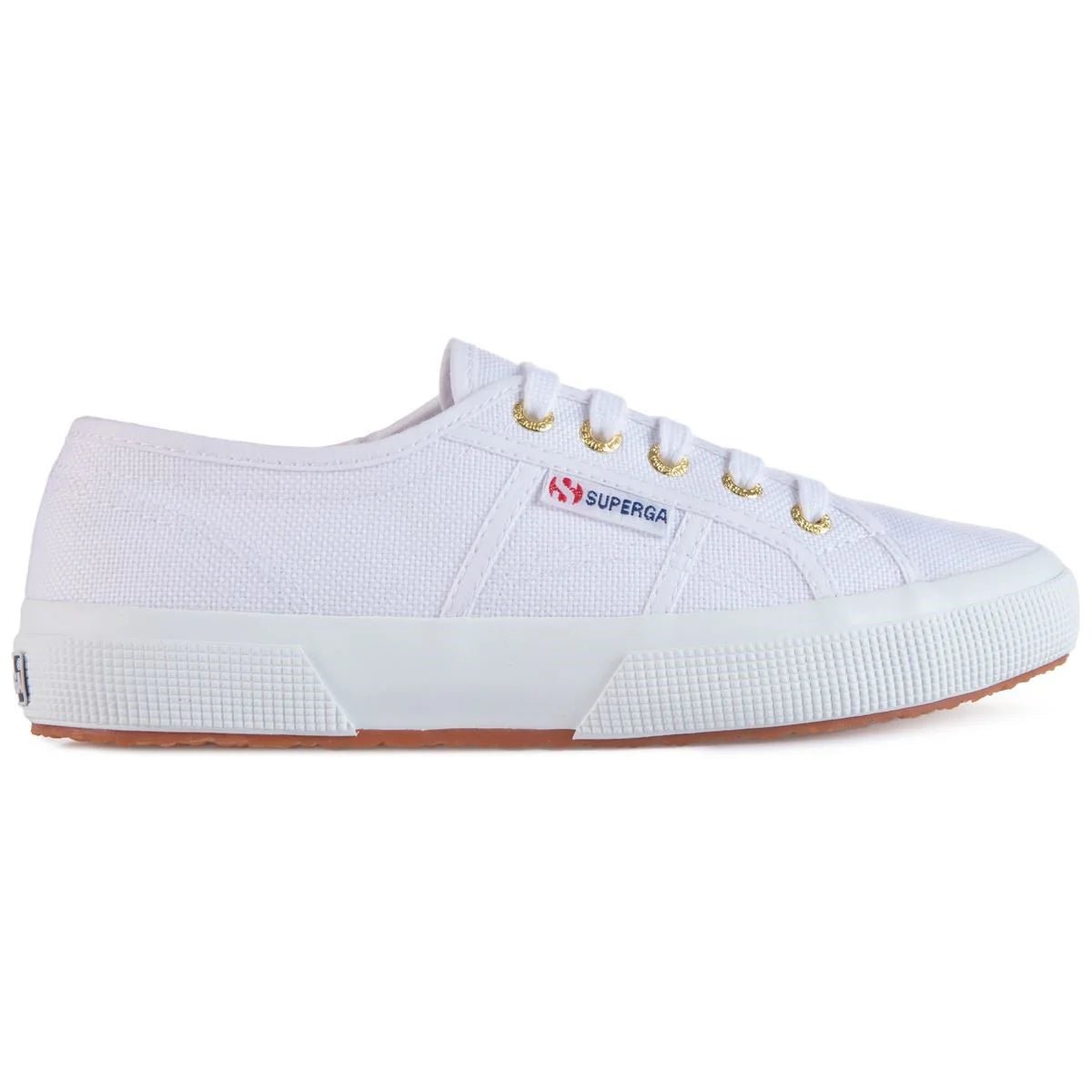 White Superga 2750 women's sneakers with pale gold accents, classic canvas design and rubber sole.